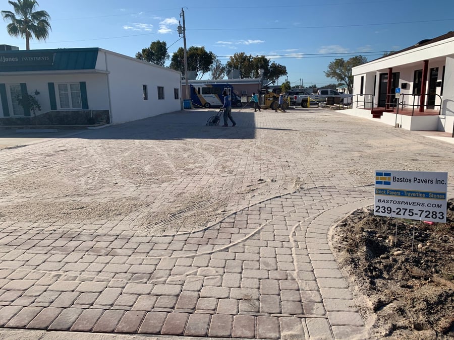 Commercial plaza parking lot paver installation in progress