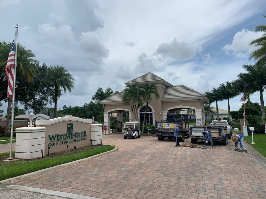 Bastos crew repairing the paver entry at Westminster Golf Club Community