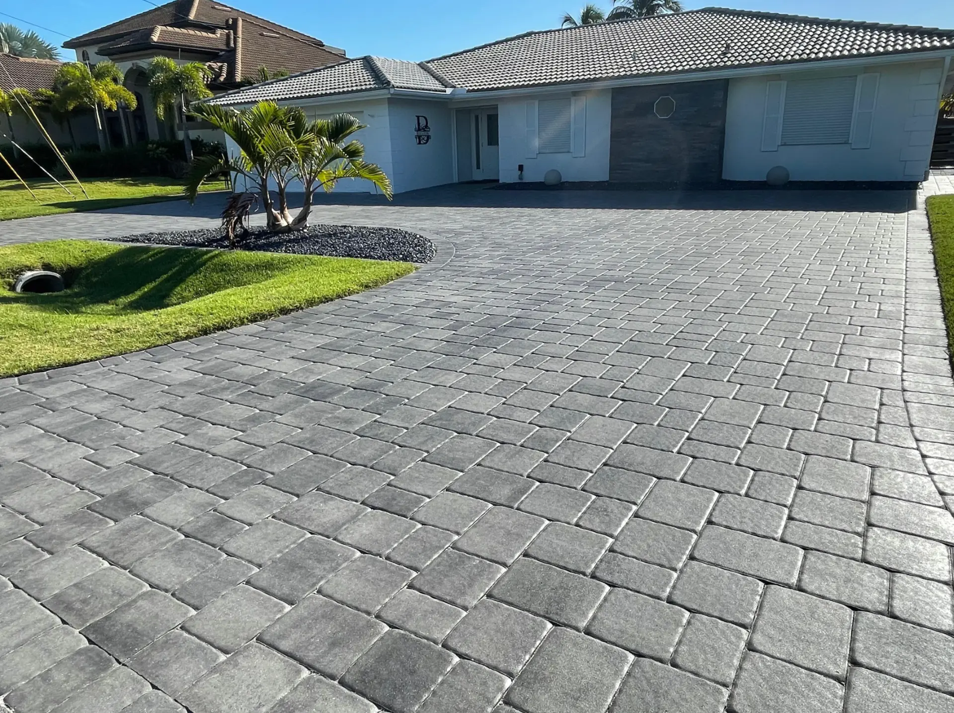 Freshly cleaned and sealed paver driveway