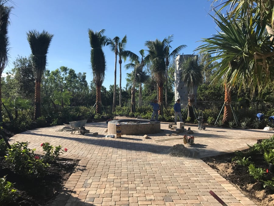 Fire pit plaza under construction at a community amenity center