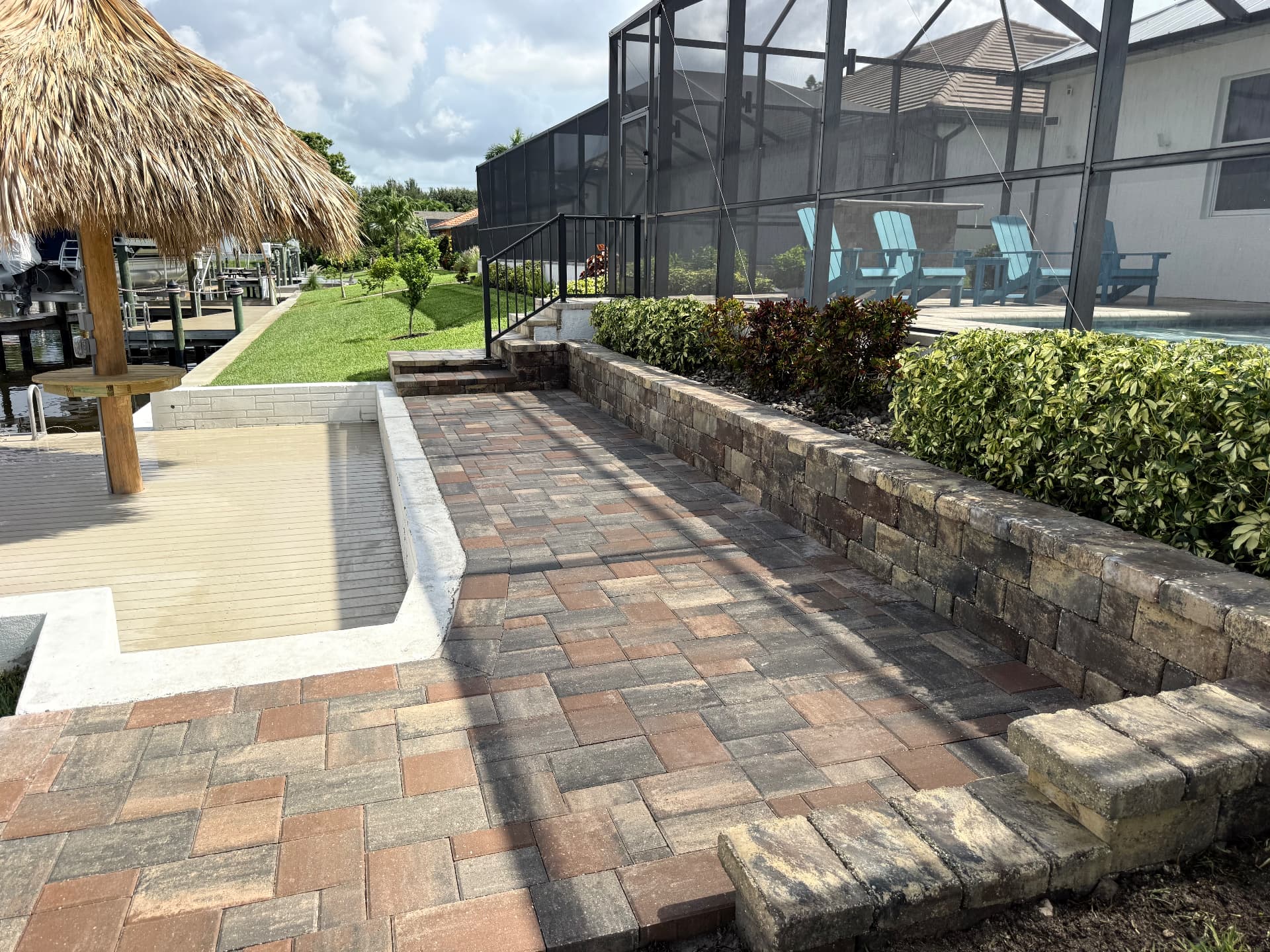 Herringbone paver patio and seat wall