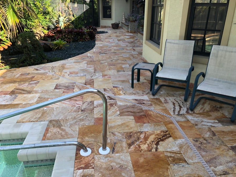 Scabos travertine pool patio with lounge seating