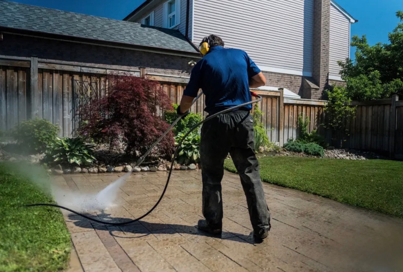 Paver cleaning on a backyard patio