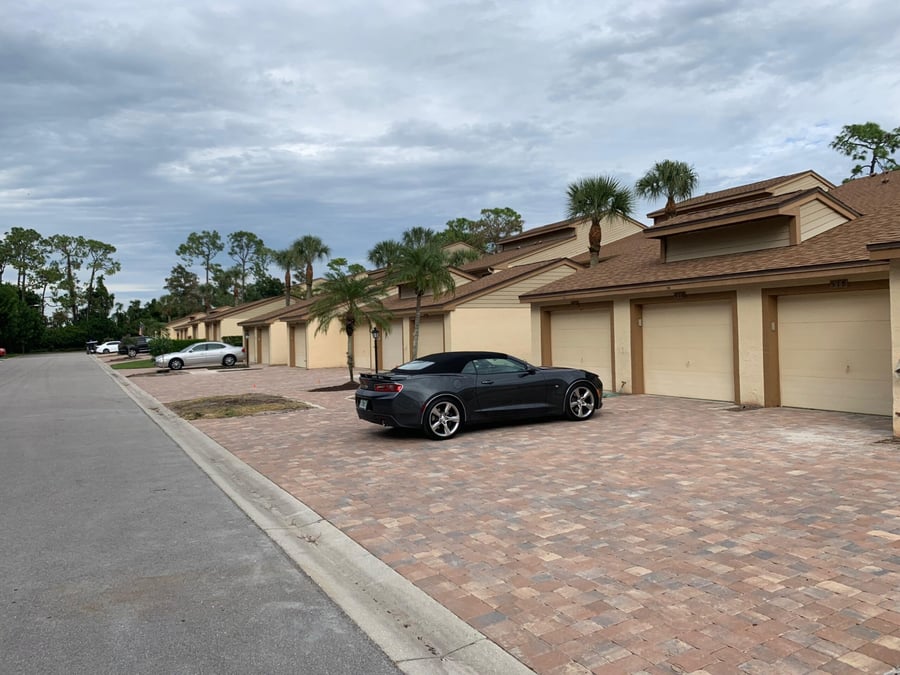 Detached garage court paved in blended tumbled pavers