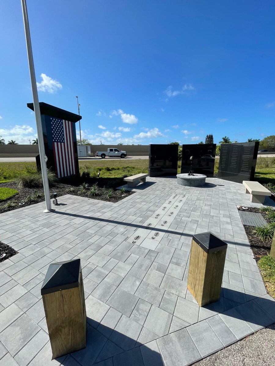 Veterans memorial plaza built in gray plank-format pavers