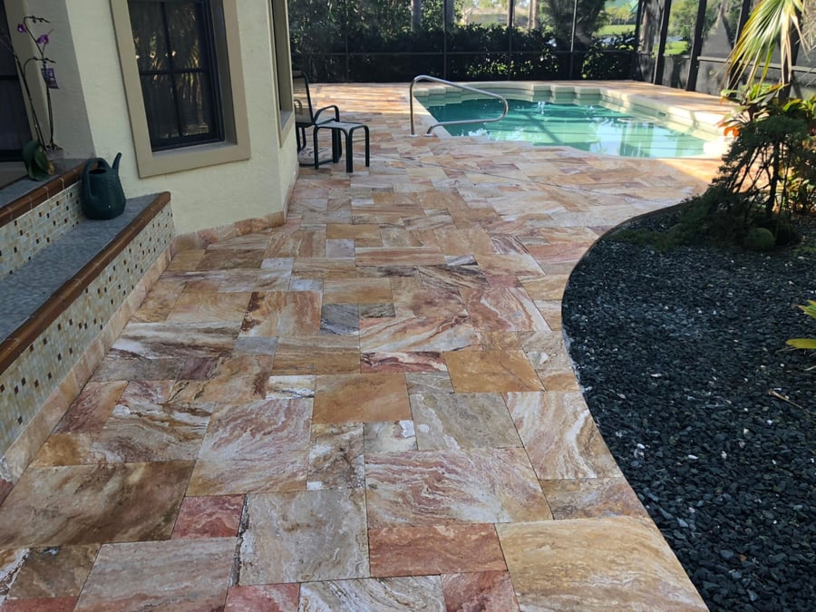 Scabos travertine French pattern pool deck