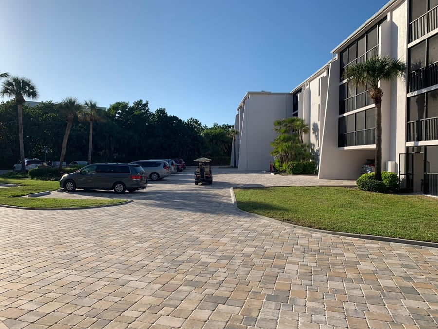 Condominium parking lot paved with interlocking pavers