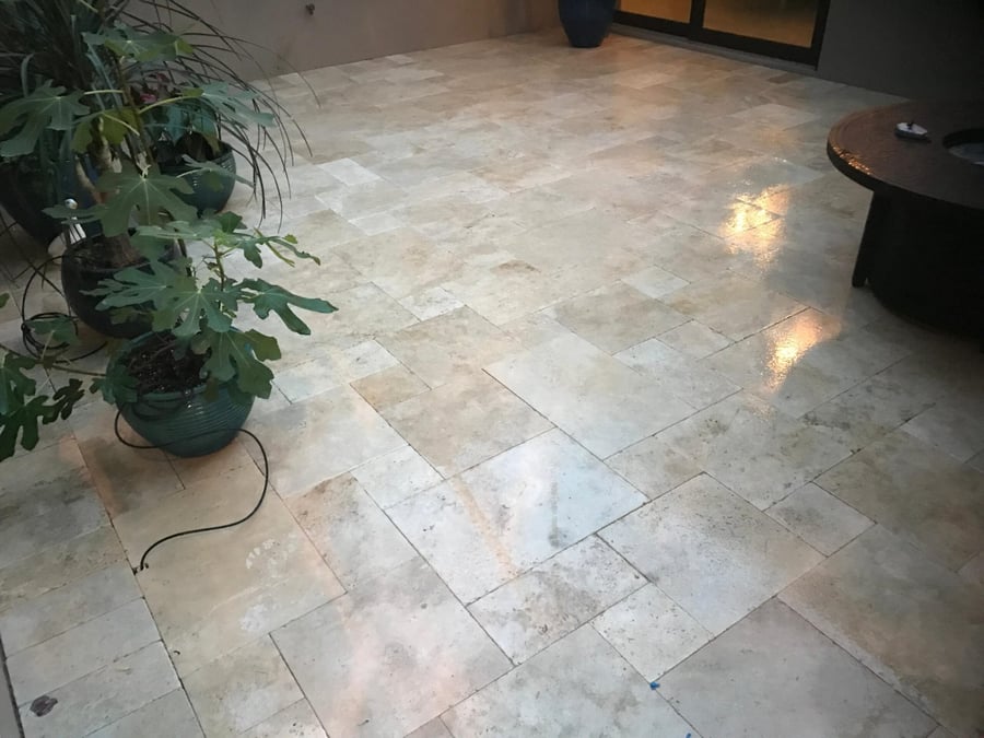 Travertine French pattern courtyard floor with planters